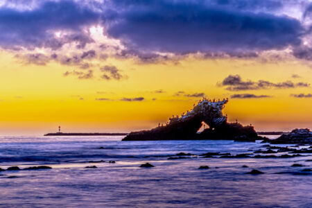 Arch Rock Jetty Sunset with the Light in the Eye