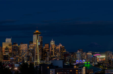 Seattle Skyline at Night with a Faint Mt Rainier