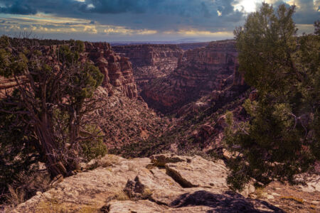 Sunlight Radiates Mule Canyon on a Cloudy Day